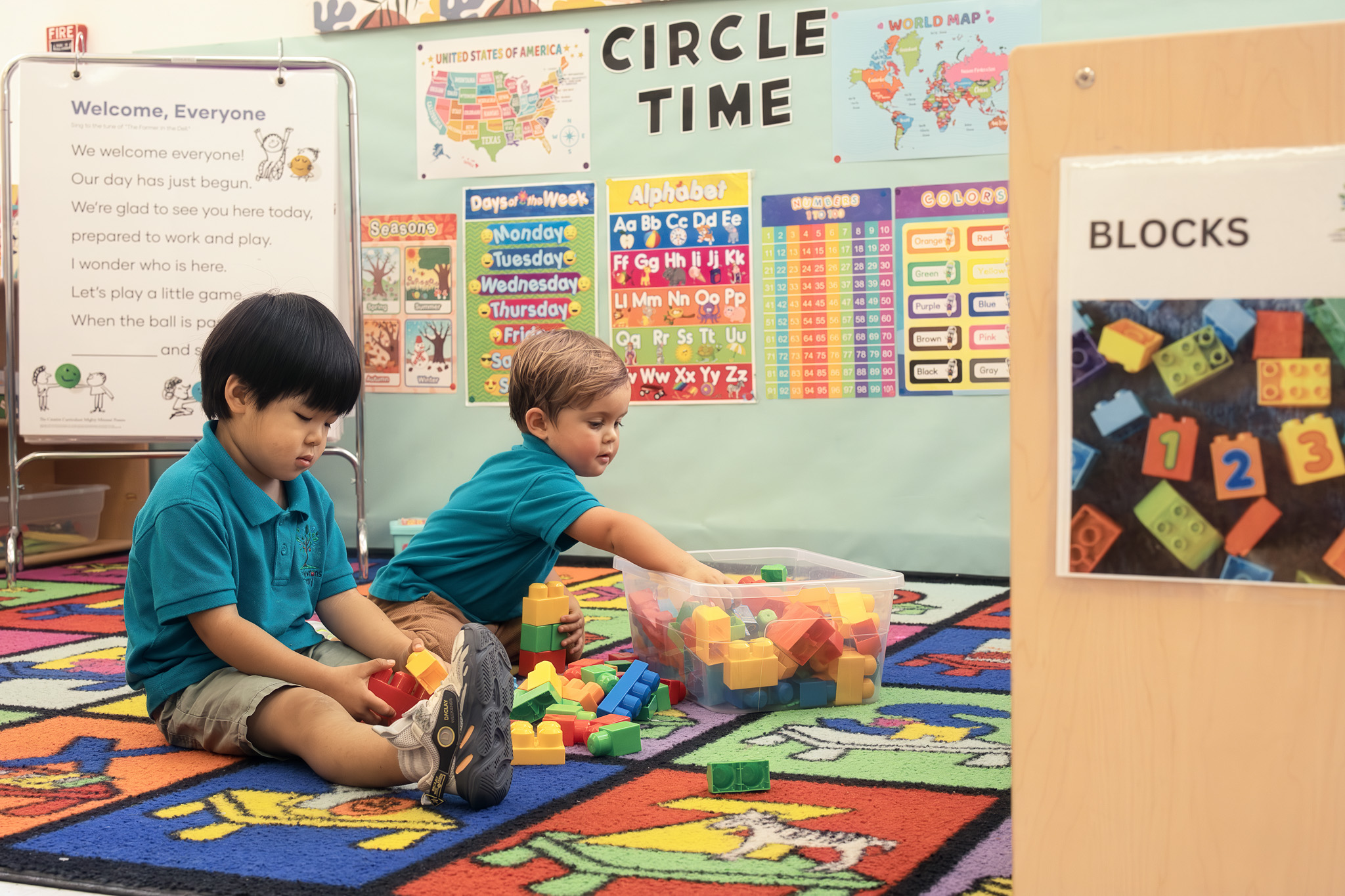 Two boys building and problem-solving with blocks