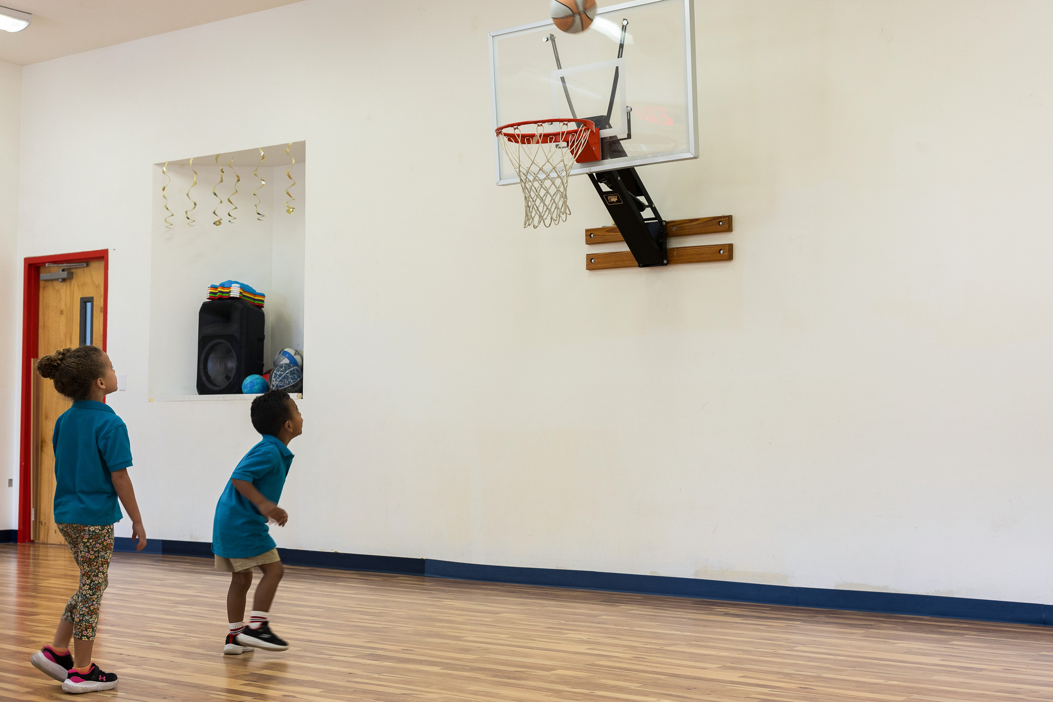 Indoor gymnasium with basketball hoop at Little Newtons